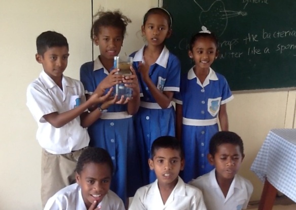 Students at the Sabeto Central School explaining their experiment on camera